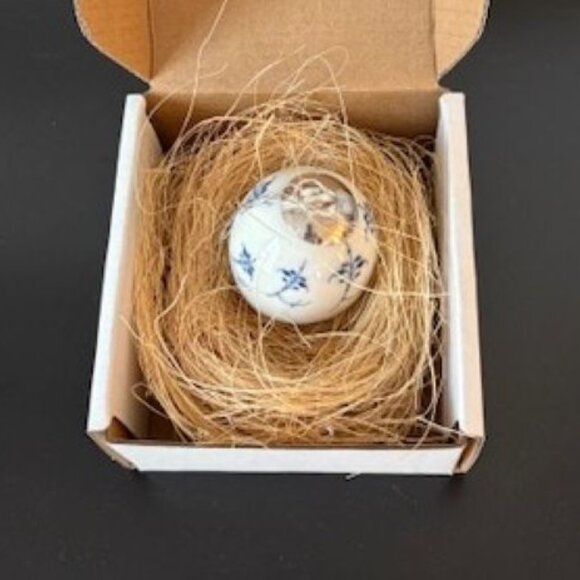 Royal Copenhagen Porcelain Blue Fluted Egg Ornament in Nest - 2.5 Inches - Picture 3 of 4